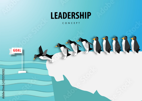 Leadership concept with leader of penguins standing on ice ,origami or paper art design vector