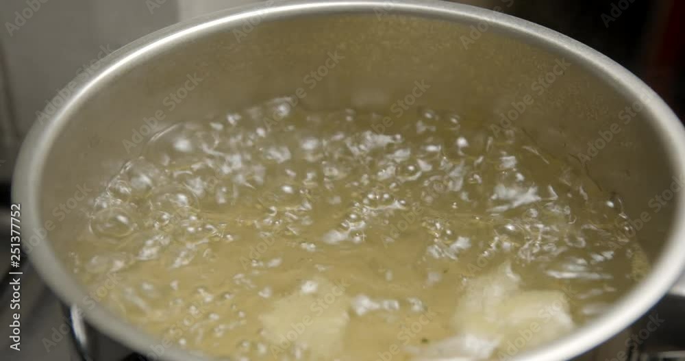 Bouillon water boiling cooking slowmotion Bouillon water boiling cooking slowmotion