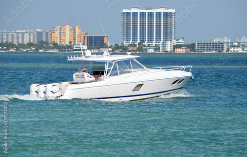 Well equipped sport fishing boat cruising on the Florida Intra-Coastal Waterway