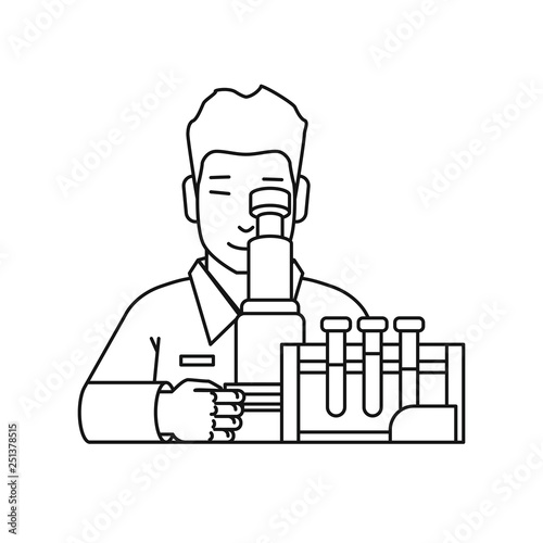 Man looking through microscope