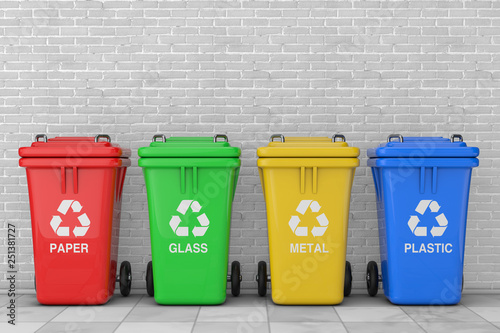 Red, Green, Yellow and Blue Recycle Bins with Recycle Symbol. 3d Rendering