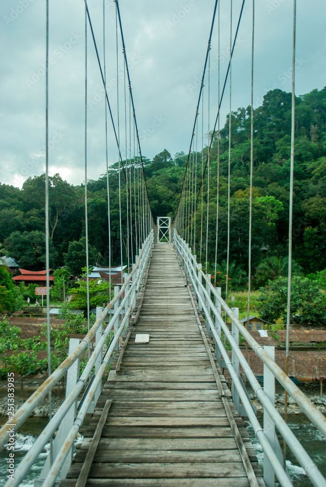 Hanging bridge in Bukit Lawang, Sumatra, Indonesia.