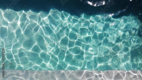 Empty swimming pool above top view on sunny day. Cleaning pool service