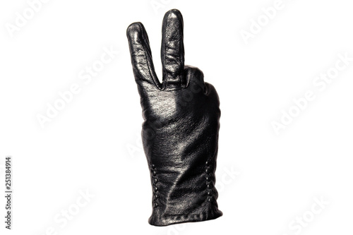 Closeup black leather glove showing number two. Isolated on white background. Concept symbols, signs, numbers