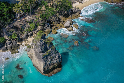 Diamond beach, aerial view, Nusa Penida, Bali, Indonesia. Beautiful beach with turquoise water, white sand and large rocks