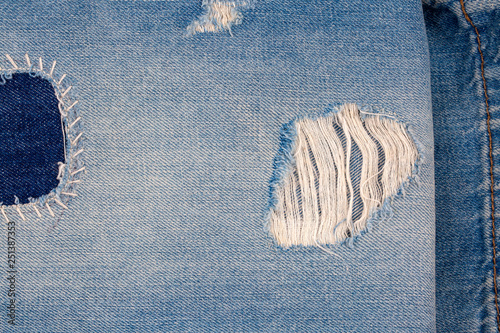 Closeup of blank jeans patch on inner side of worn blue denim