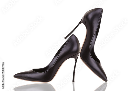 Black elegant high-heeled shoes. Female shoes on a white background.