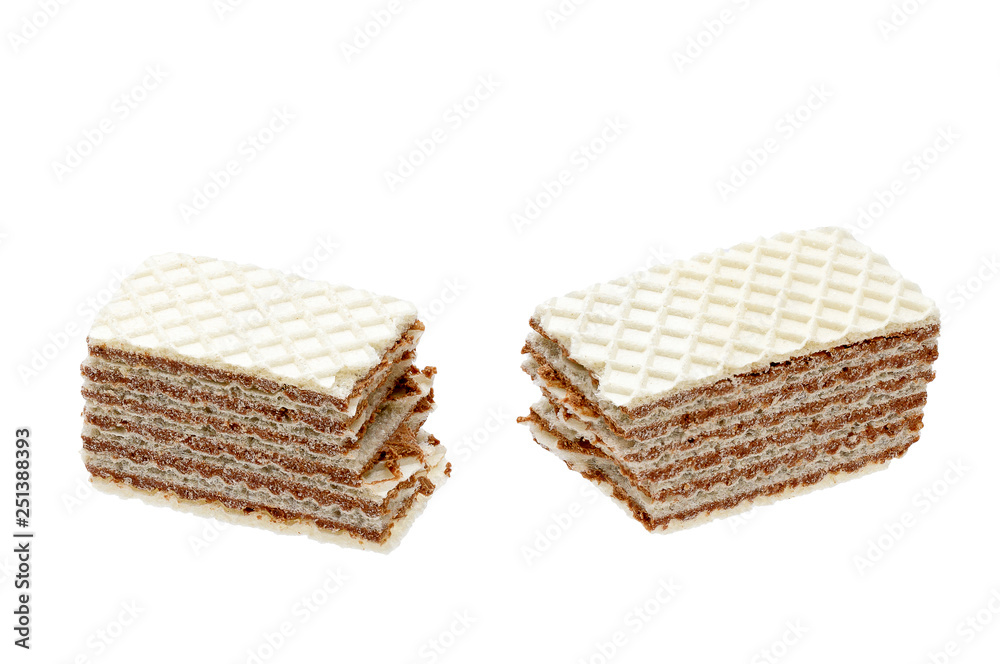Isolated chocolate cracked crispy wafers with crumbs on white background. Food and snack for sweet tooth Isolated chocolate cracked crispy wafers with crumbs on white background. Food and snack for sweet tooth