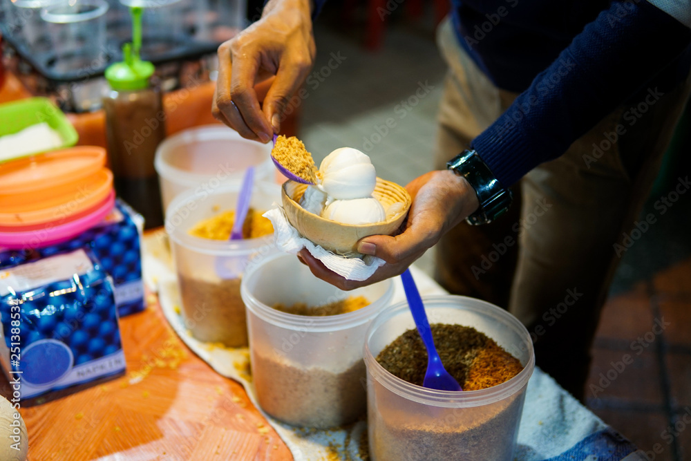 Johor Bahru,Malaysia - February 2019 : A famous thailand coconut ice cream sold on street in Johor Bahru Johor Bahru,Malaysia - February 2019 : A famous thailand coconut ice cream sold on street in Johor Bahru