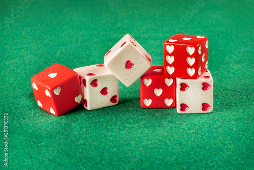 Photography Set of six dices with heart-shaped dots