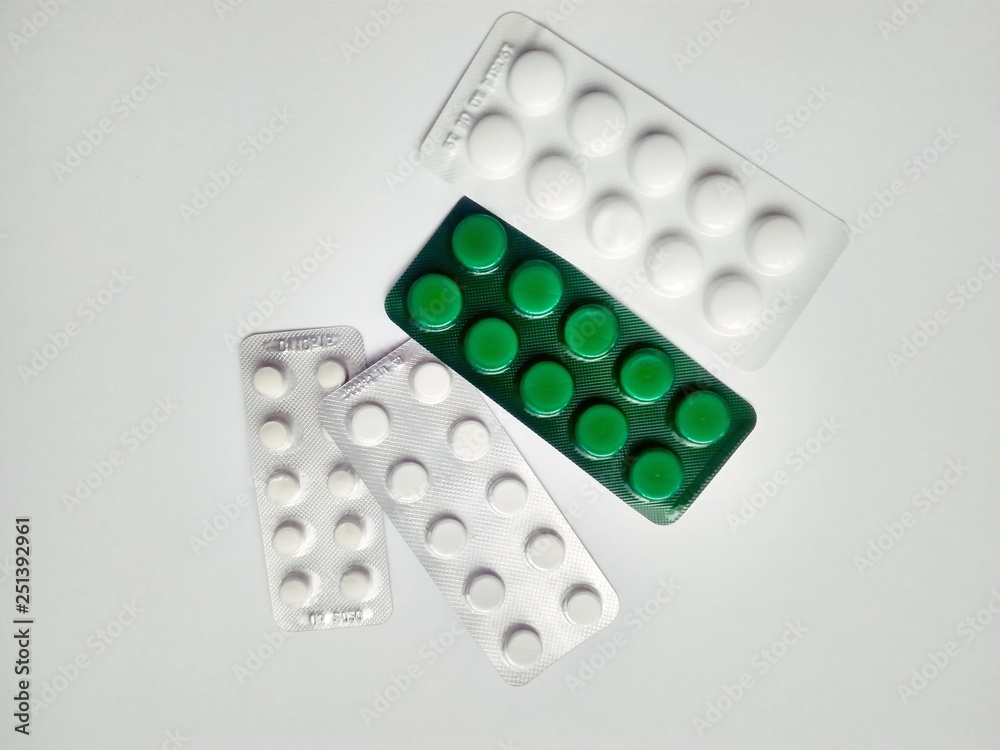 Few medicine pills pack on white background Few medicine pills pack on white background