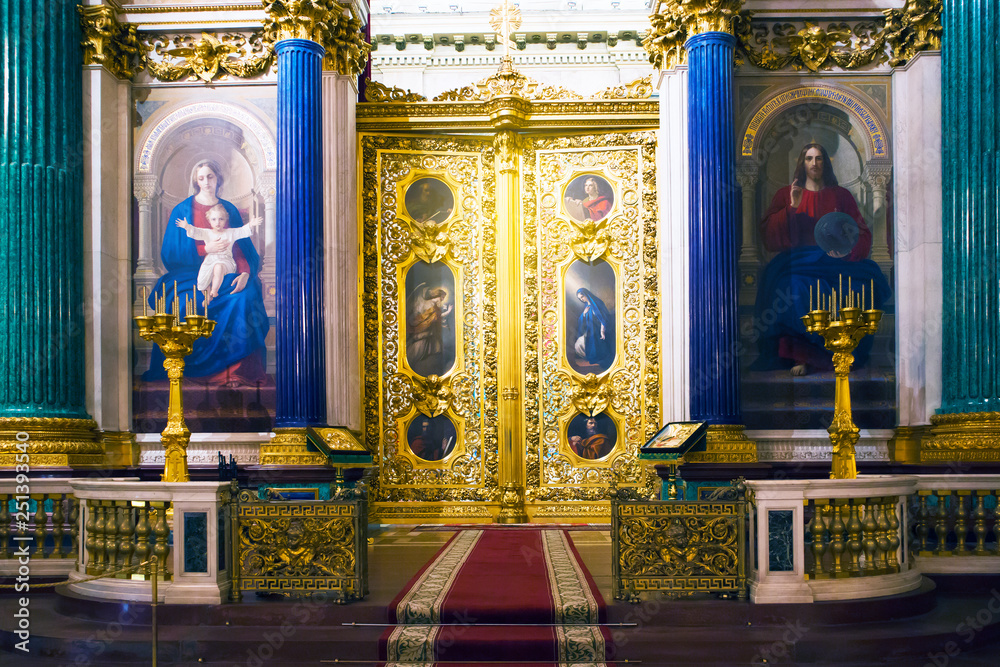 Fragment of rich decorated interior of ancient Saint Isaac's orthodox cathedral, altar entrance