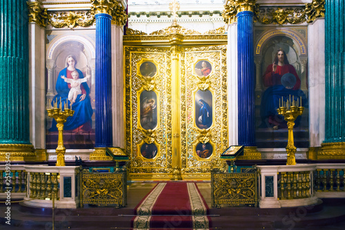 Fragment of rich decorated interior of ancient Saint Isaac's orthodox cathedral, altar entrance