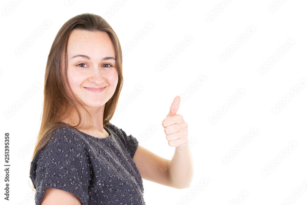 Young happy cheerful woman showing thumb up giving the thumbs up against a white background Place for text Young happy cheerful woman showing thumb up giving the thumbs up against a white background Place for text