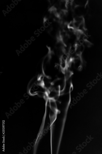 White smoke on black background