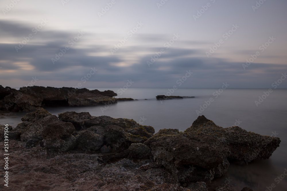 A sunrise by the sea in long exposure