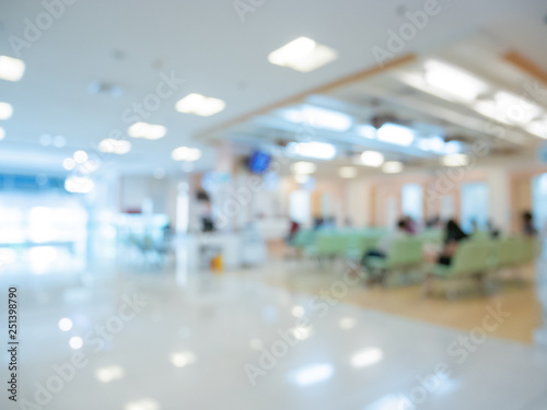 Blur image Background of people in clinic lobby hall at modern hospital to pay money for medical expenses. photo