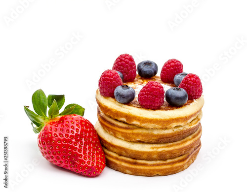 Pile of pancakes with berries