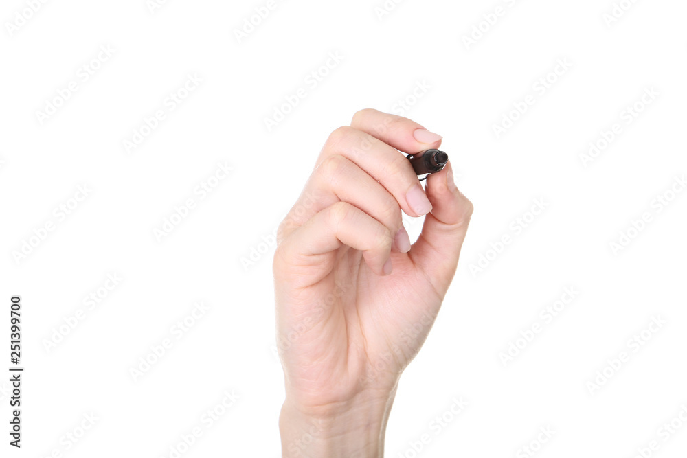 Female hand holding marker on white background Female hand holding marker on white background