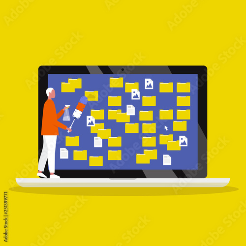 Young male character cleaning up the desktop folders. Digital hygiene. Computer files. Mess. Conceptual vector illustration, clip art