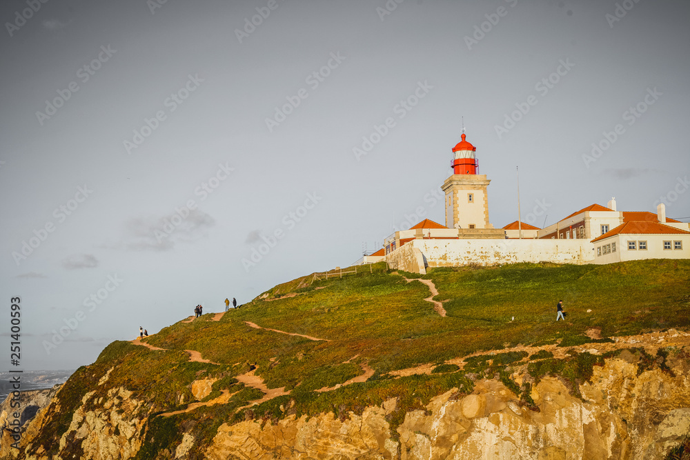 Picturesque view of Cabo da Roca Lighthouse on hill at sunny day, Portugal