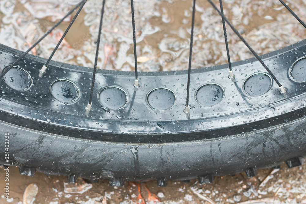 fatbike wheel in the puddle