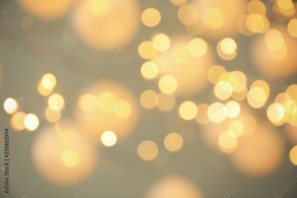 Blurred view of shiny gold lights. Bokeh effect Blurred view of shiny gold lights. Bokeh effect