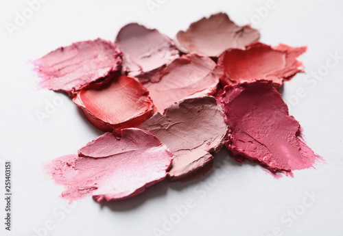 Collection of lipstick swatches on white background