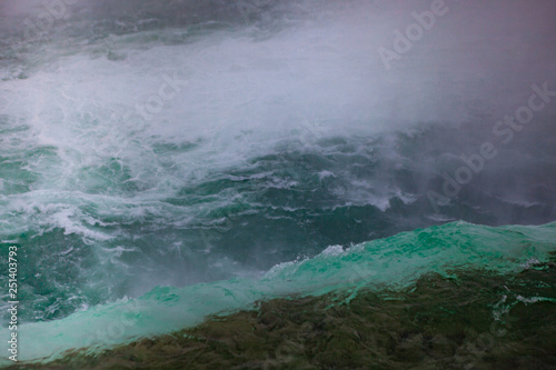 Niagara Falls CANADA - February 23, 2019: Winter frozen idyll at Horseshoe Falls, the Canadian side of Niagara Falls, view showing as well as the upper Niagara River photo