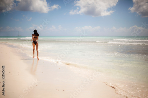 Beach Run. Fitness Woman In Bikini Running In Summer
