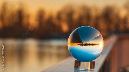 Crystal ball sunset shot with reflections at Plattling-Isar-Bavaria-Germany