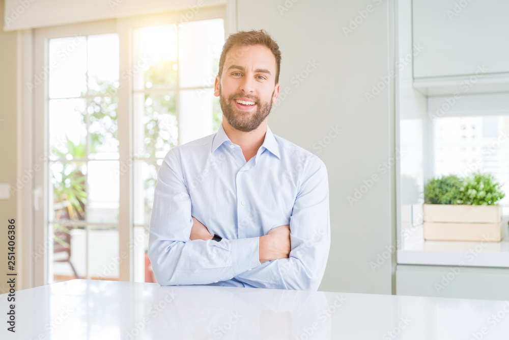 Handsome business man happy face smiling with crossed arms looking at the camera. Positive person.