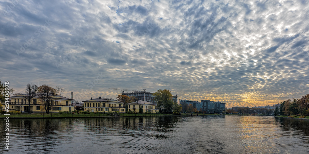 General view of Srednyaya (Middle) Nevka river shoreline and embankment architecture. Saint-Petersburg, Russia.
