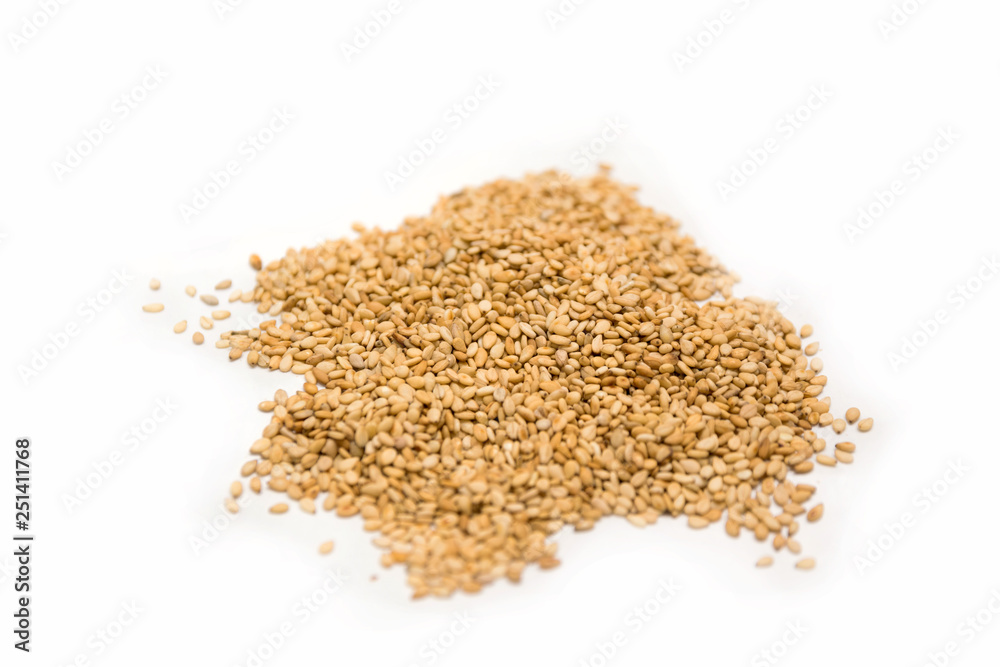 Pile of sesame seeds isolated on a white background Pile of sesame seeds isolated on a white background