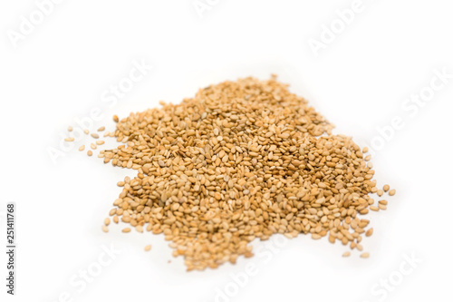 Pile of sesame seeds isolated on a white background