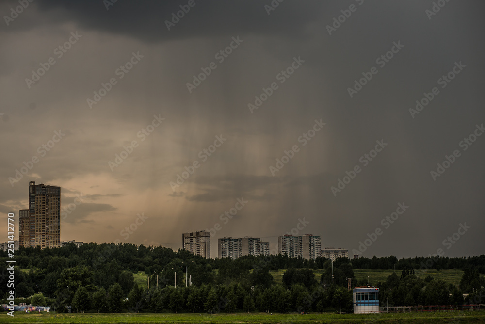Rain wall on a cloudy day over Moscow