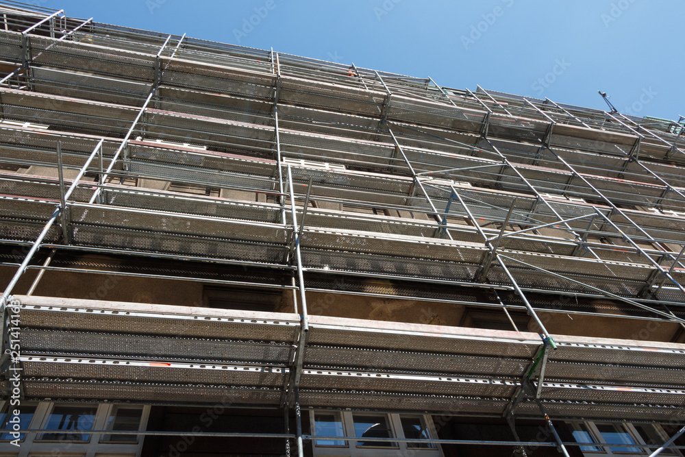 Scaffolding on the facade of a building in renovation