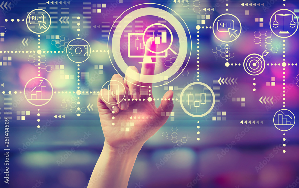 Stock trading concept with hand pressing a button