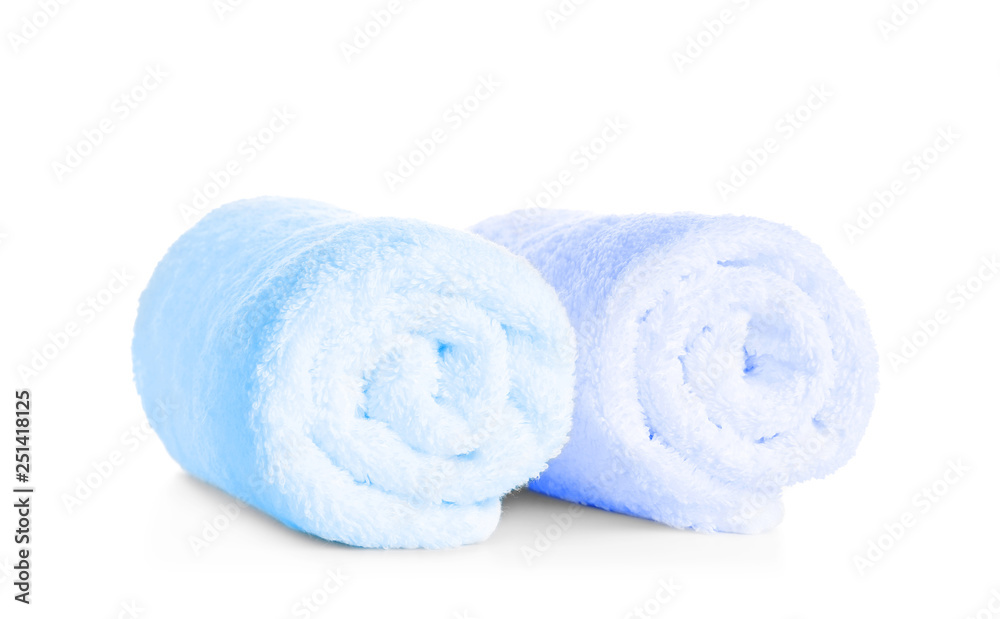 Rolled clean soft towels on white background Rolled clean soft towels on white background