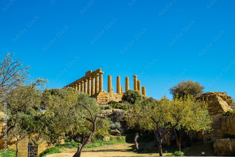 Ruined doric columns Greek Temple of Heracles in ancient Valley of Temples, Agrigento, Sicily