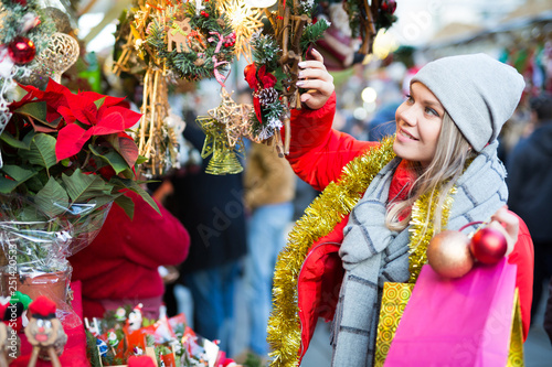 Girl shopping Christmas decorations