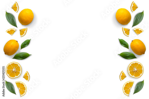 Frame of lemon and leaves. Flat lay. Food concept. Lemon on white background.Flat lay.Top view.Copy space.