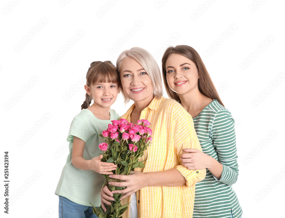 Beautiful mature lady, daughter and grandchild with flowers on white background. Happy Women's Day Beautiful mature lady, daughter and grandchild with flowers on white background. Happy Women's Day