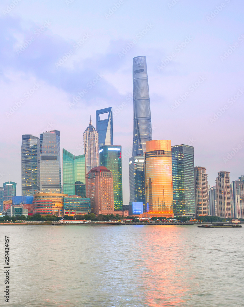 Naklejka premium Illuminated Shanghai Downtown at twilight