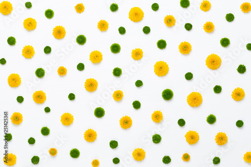 Fototapeta Naklejka Na Ścianę i Meble -  Flowers composition. Pattern made of yellow flowers on white background. Flat lay, top view.