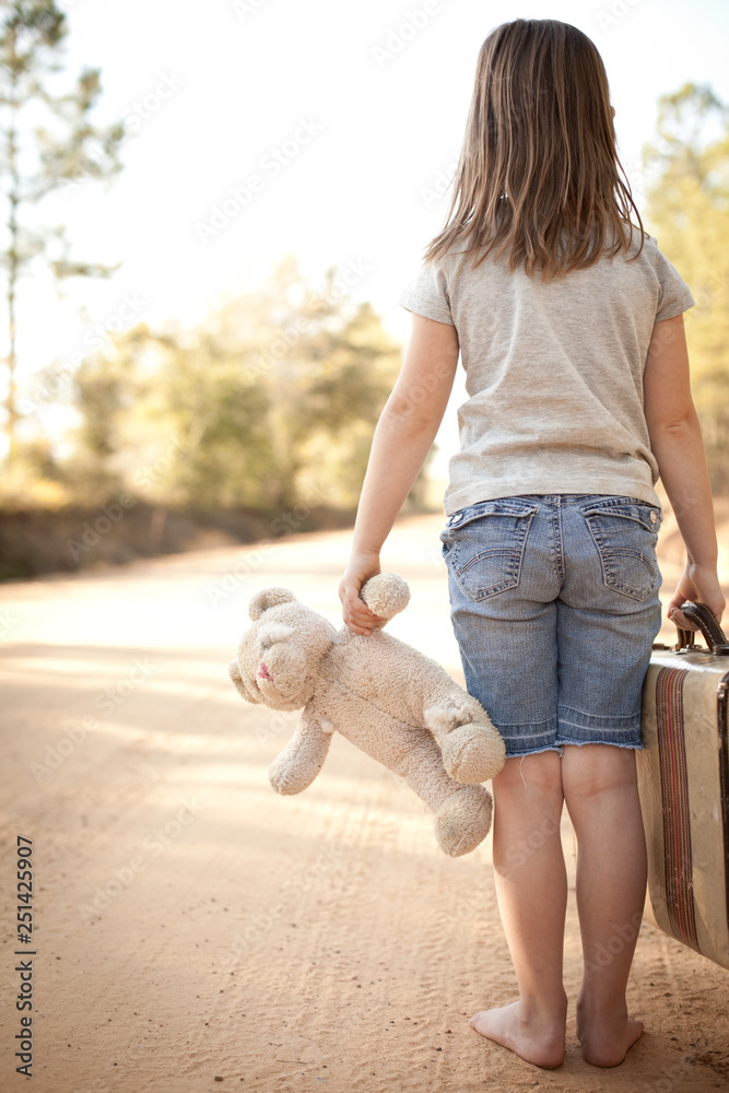 Little Girl with Ragged Teddybear and Suitcase - Poverty, Homelessness, Runaway Child Little Girl with Ragged Teddybear and Suitcase - Poverty, Homelessness, Runaway Child