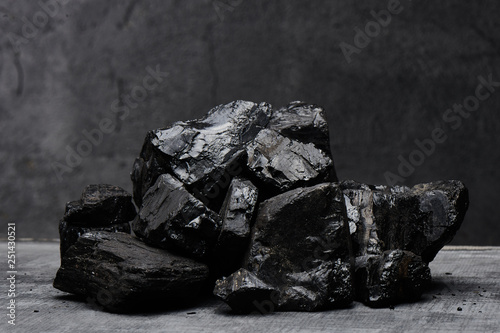 Murais de parede Natural coal on a black background isolated closeup