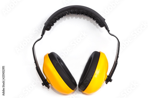 Industrial yellow protective headphones isolated on white background
