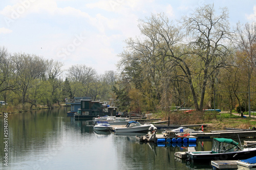 Boats and Houseboats in a Channel © John