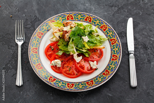 Healthy salad with fresh tomato